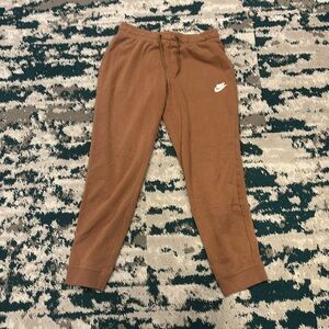 Golden brown Nike joggers, size M